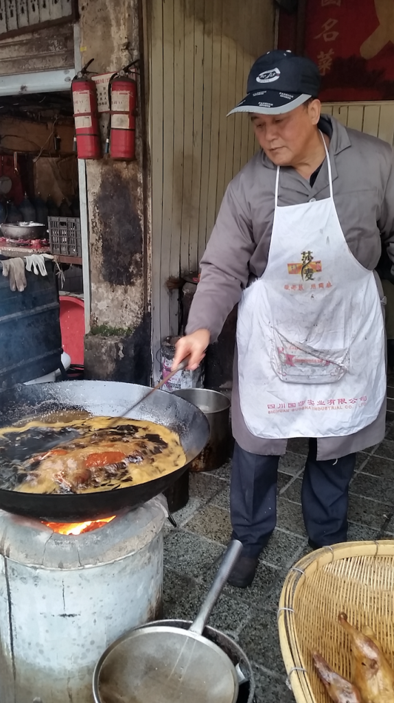 Bought a fried duck from the market behind our apartment. 