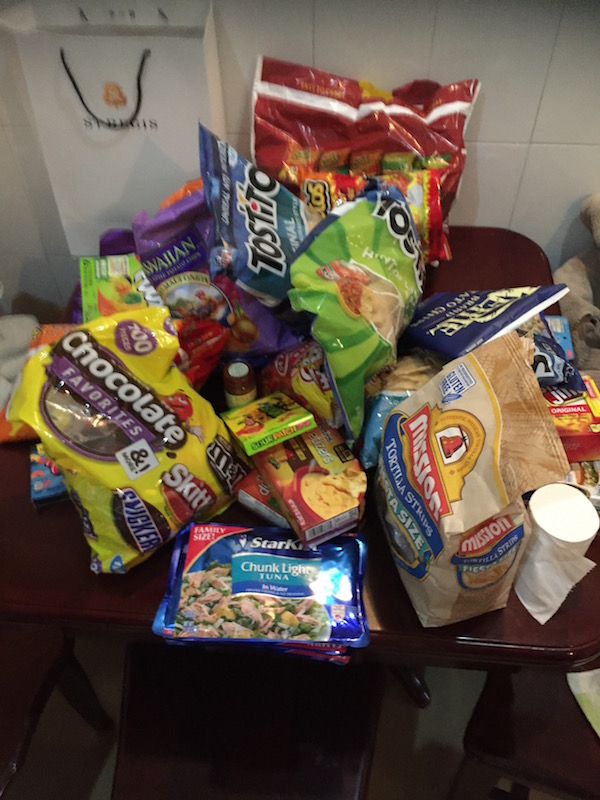 The plethora of American junk food that Celina's mother and father, Mary and John, brought for the girls.