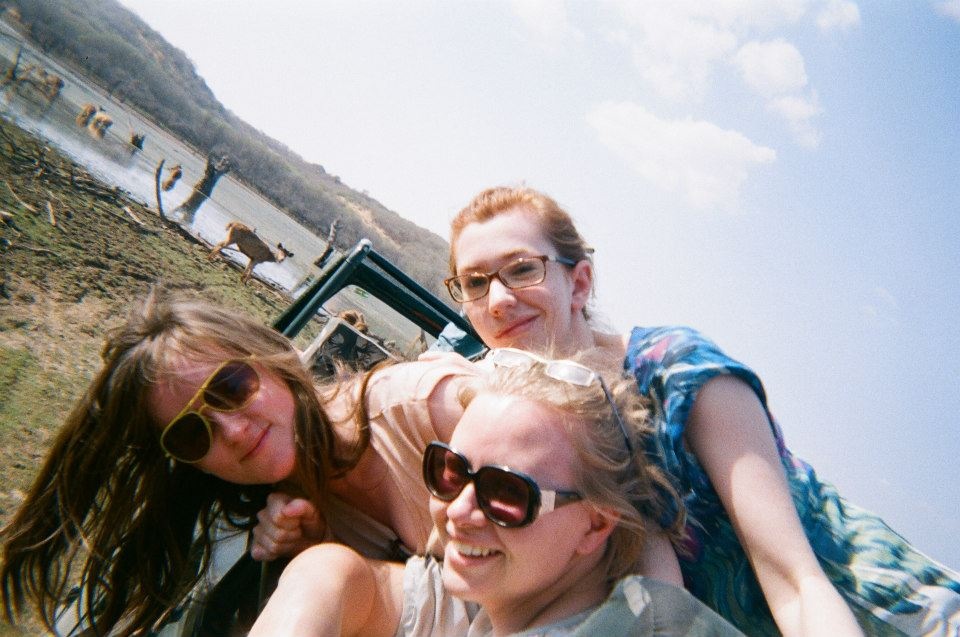 A few of the researchers in India, trying not to fall out of the jeep, joining the sambar deer.