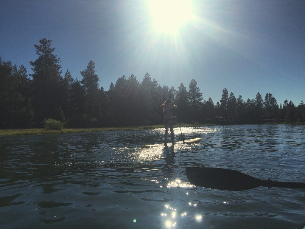 Paddle boarding down the Deschutes River in Bend, OR 